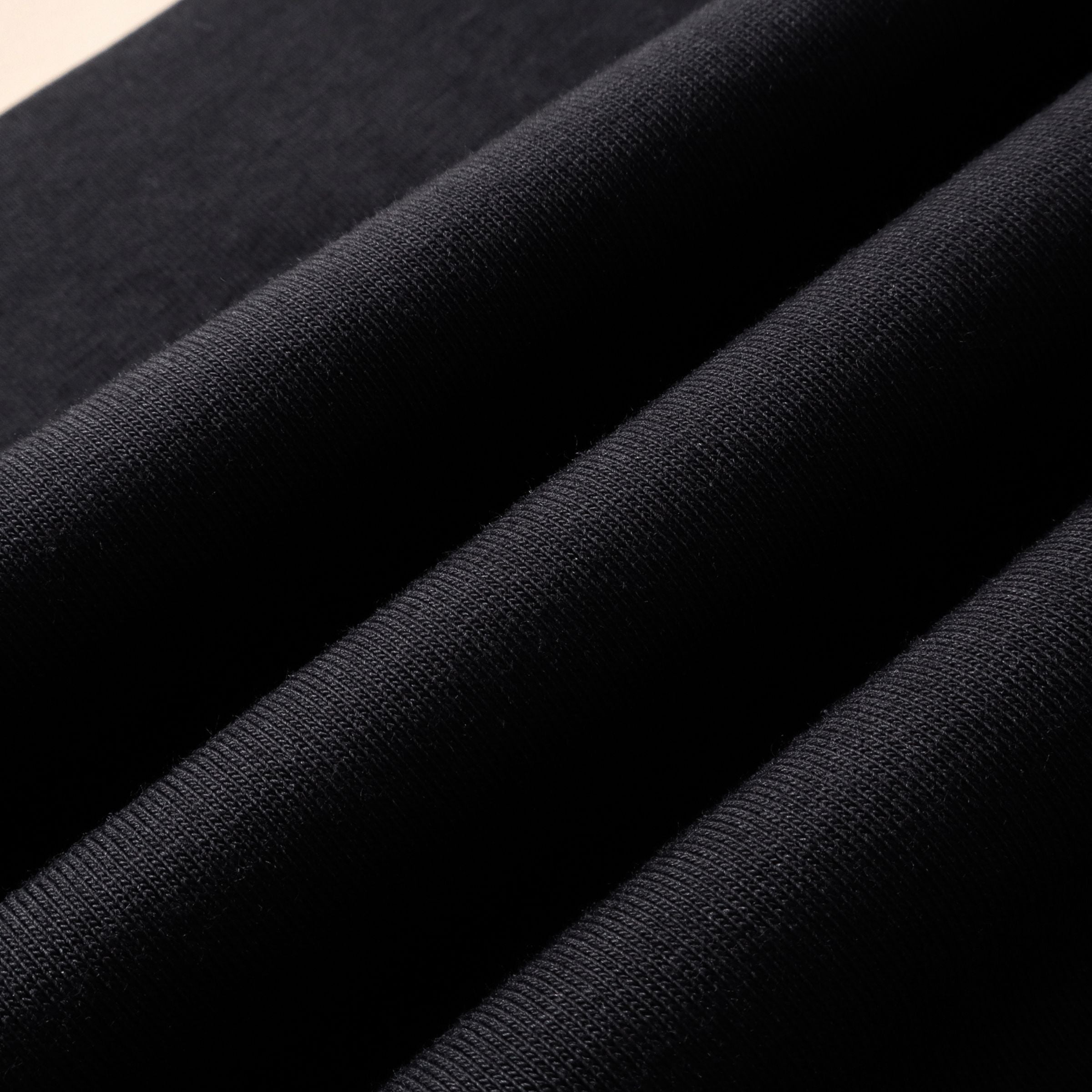 Fabric texture of Sun Sea and Sand oversized t-shirt