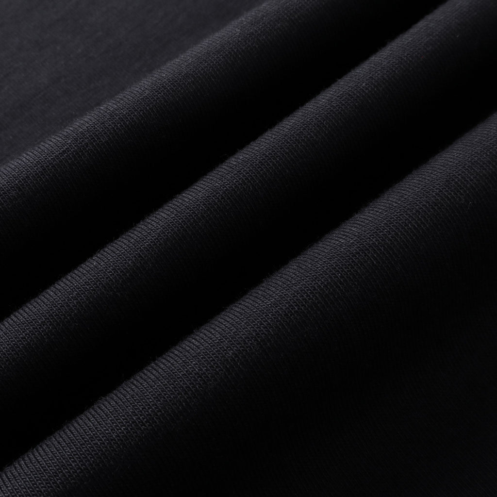 Fabric texture of Boba Travel oversized t-shirt in black