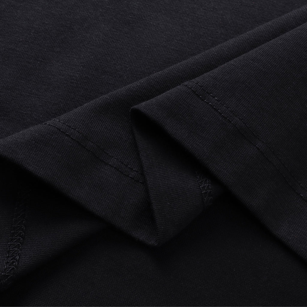 Fabric texture of Boba Travel oversized t-shirt in black