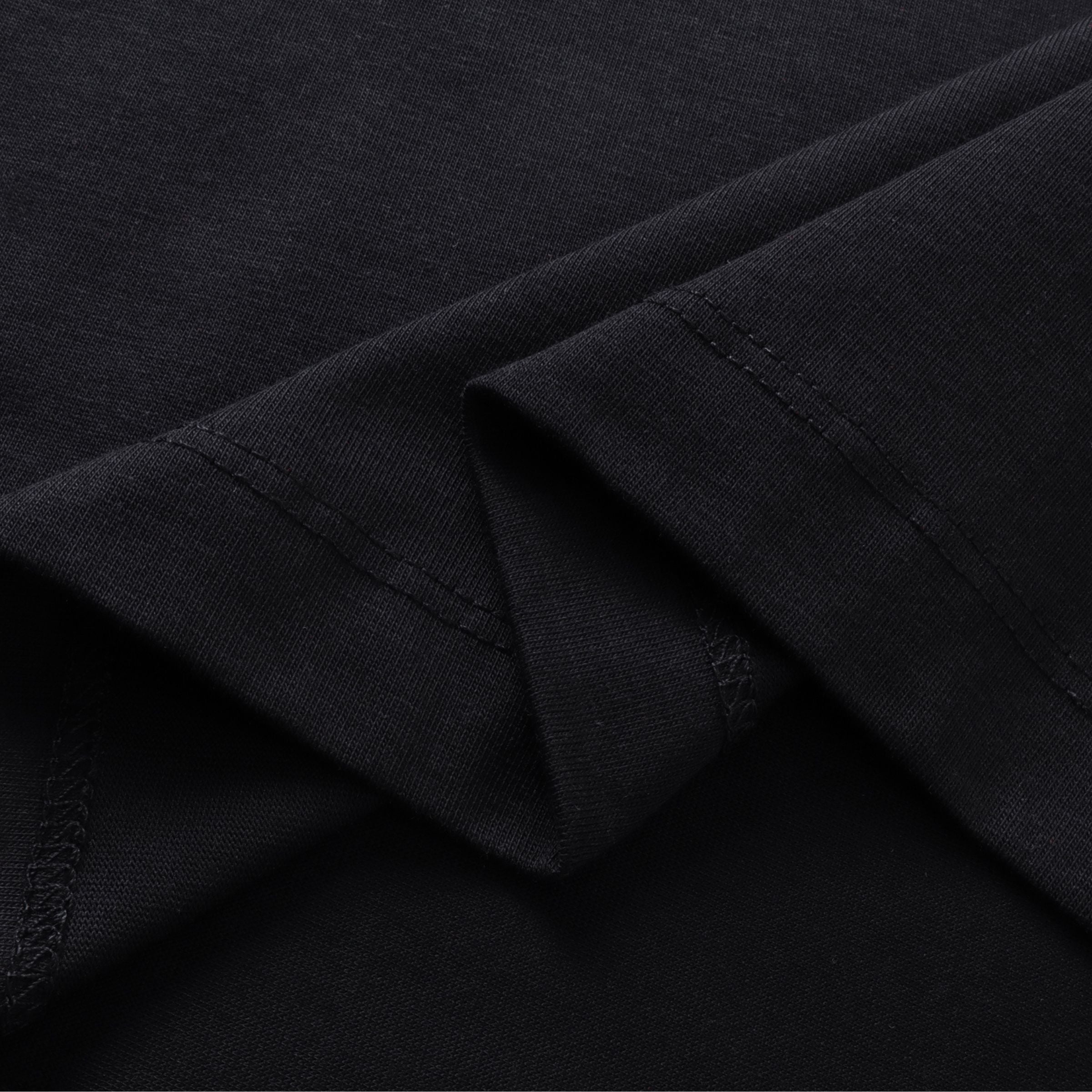 Fabric texture of Boba Travel oversized t-shirt in black