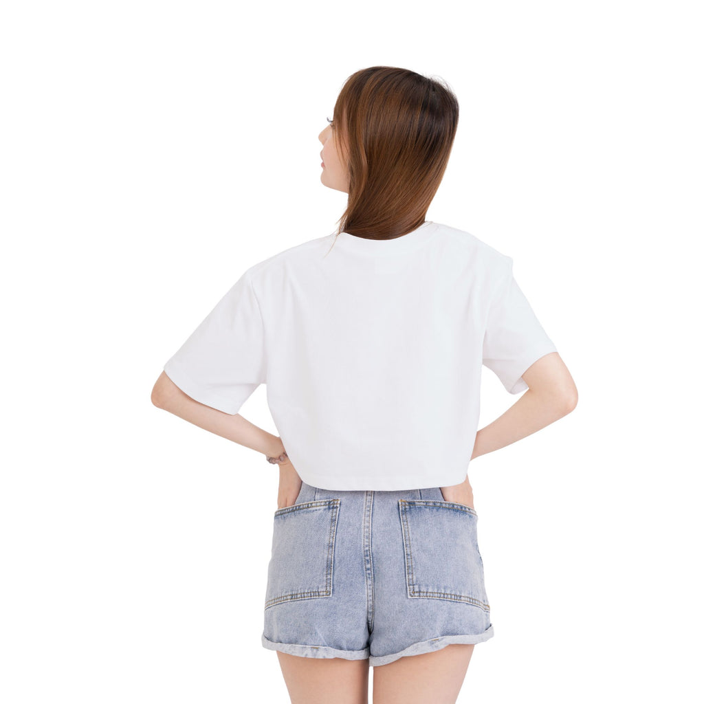 Back view of model wearing Garden of Cheer crop top with relaxed fit